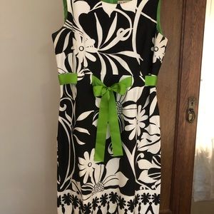 Brown and black dress with green sash. Size 12.